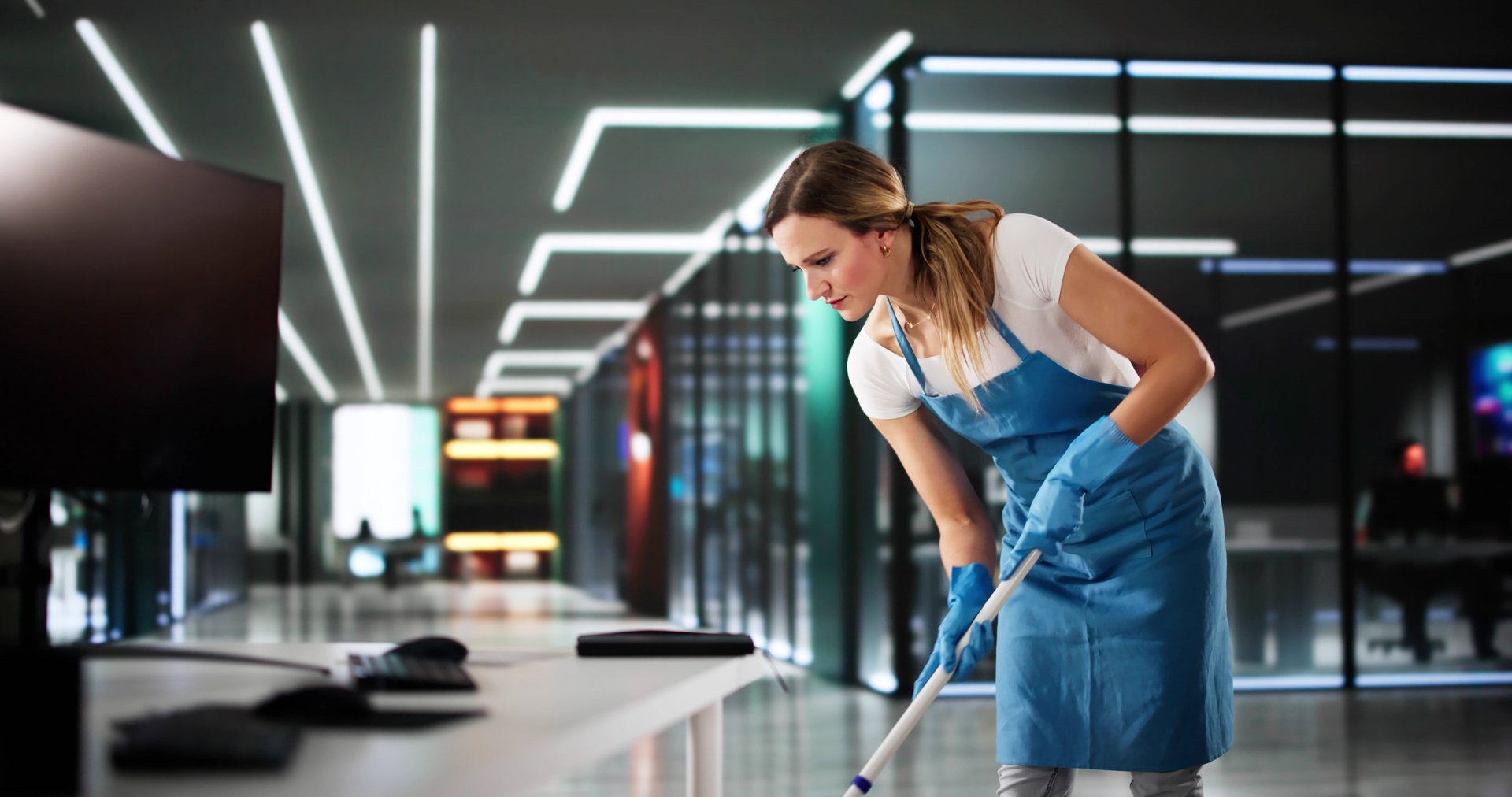 Professional Cleaner At Hotel Uses Mop To Clean Floors